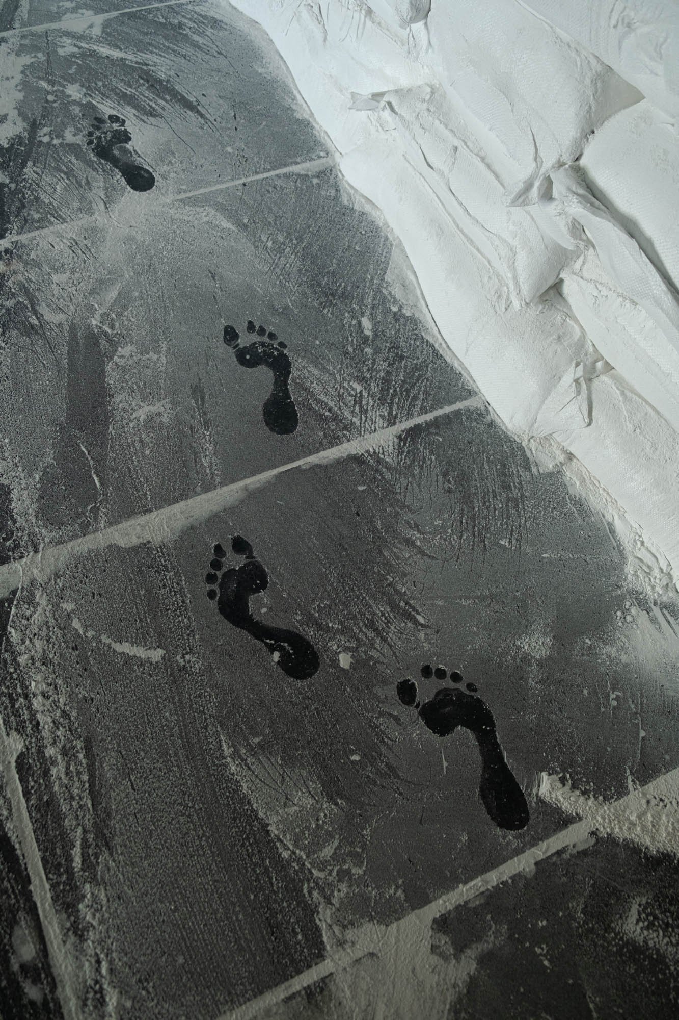 Footprints on factory floor during soap manufacturing process