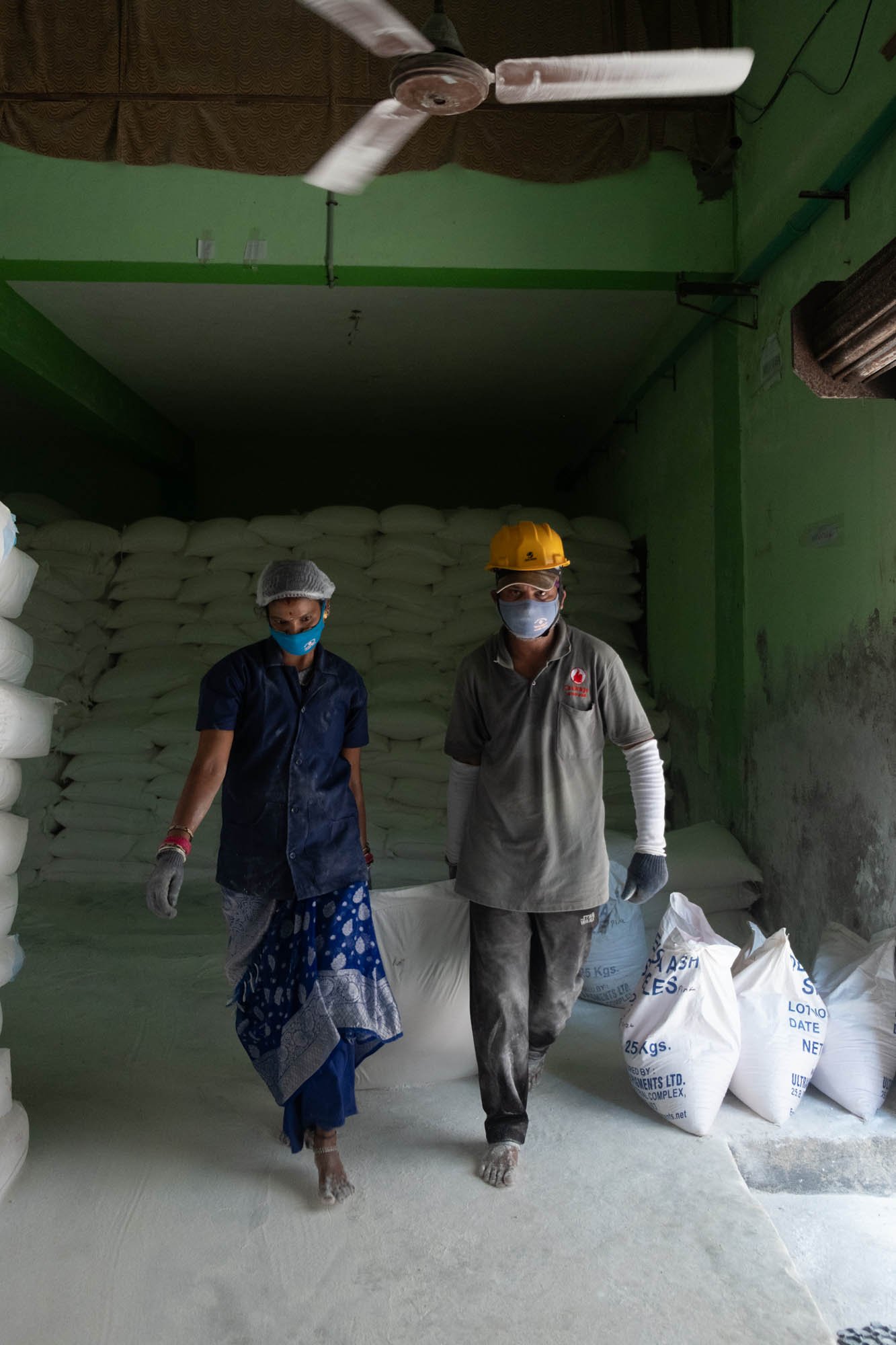 Factory workers inside Challenge Soap manufacturing plant