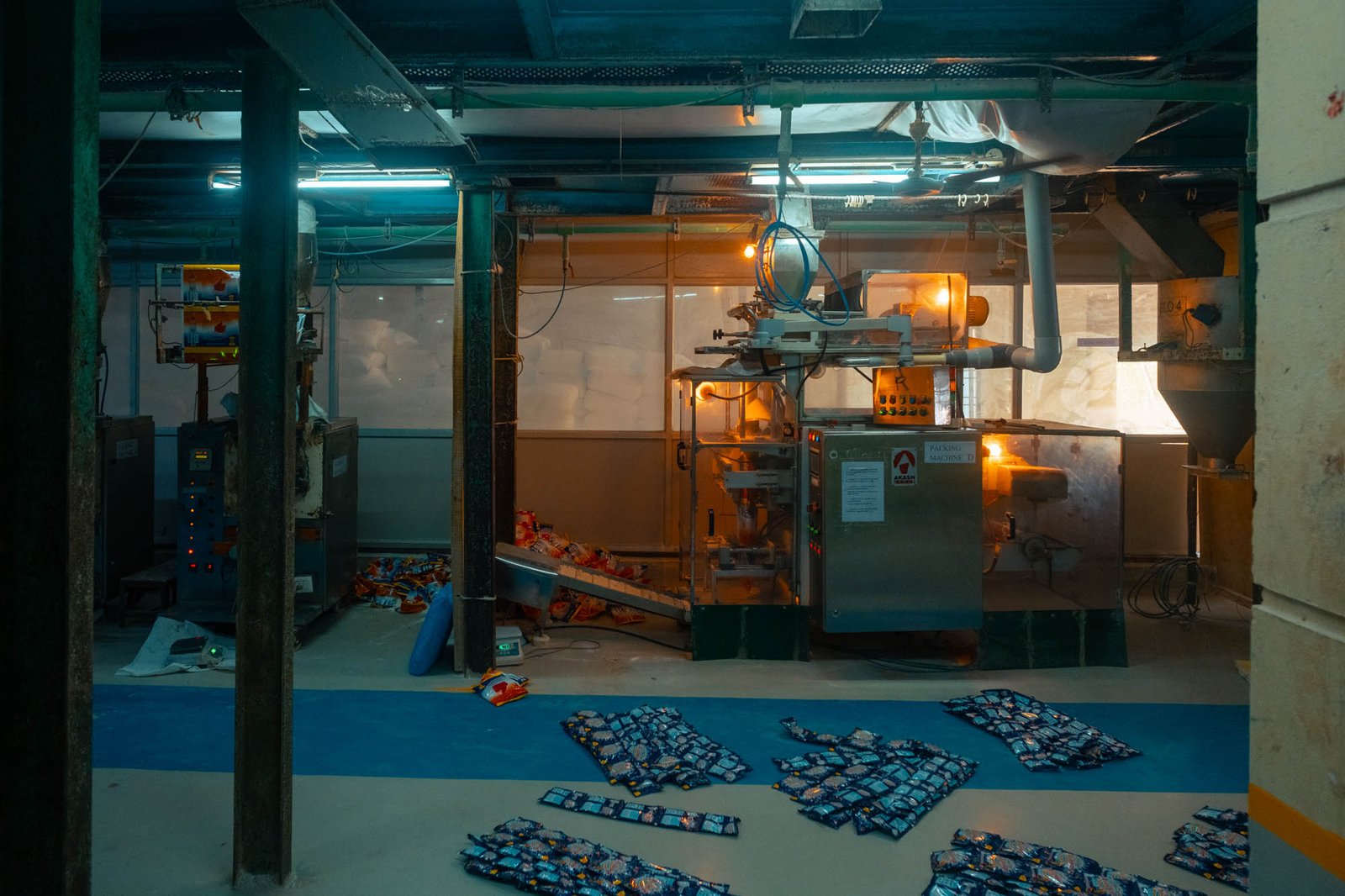 Soap manufacturing machinery inside Challenge Soap production facility